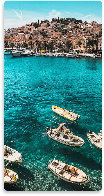 Paisagem com mar barcos e casas